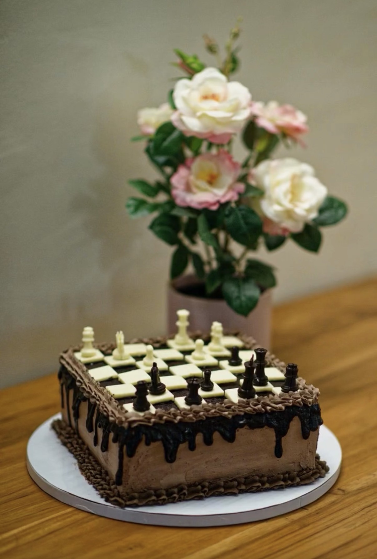 Chocolate chess board cake with ganache drip